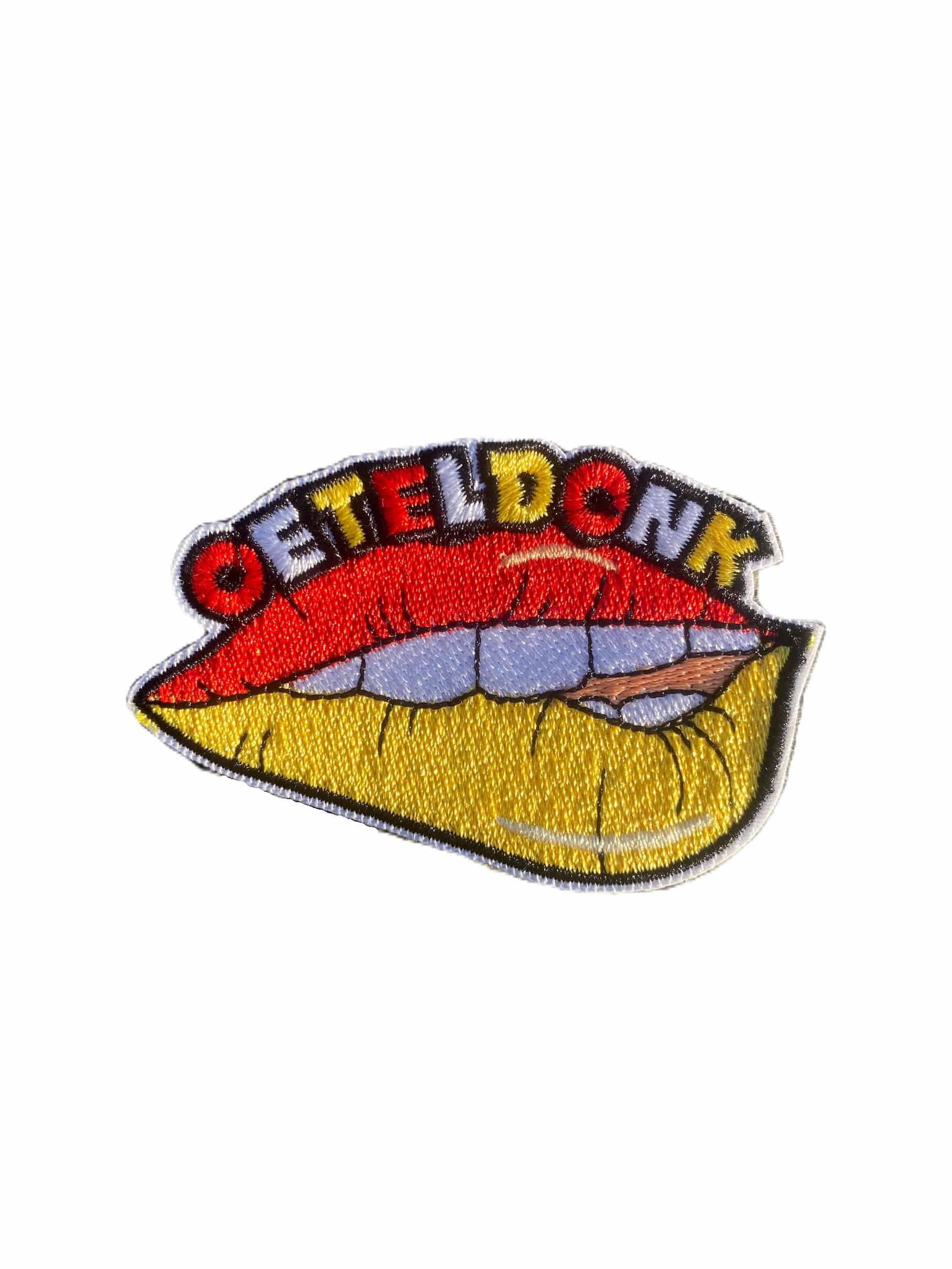 Embleem Bijtende Lip