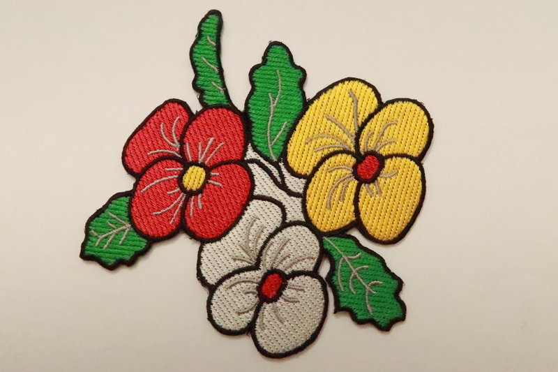 embleem borduur bloemen
