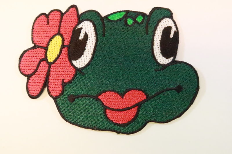 Embleem Oetel gezichtje en bloem, Carnaval in Oeteldonk