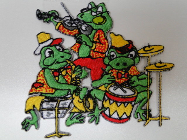 Oetel embleem, 3 kikker muzikanten